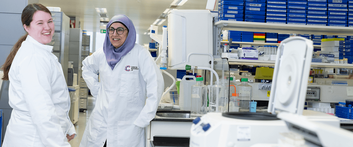 Smiling shot of a researchers in the lab.