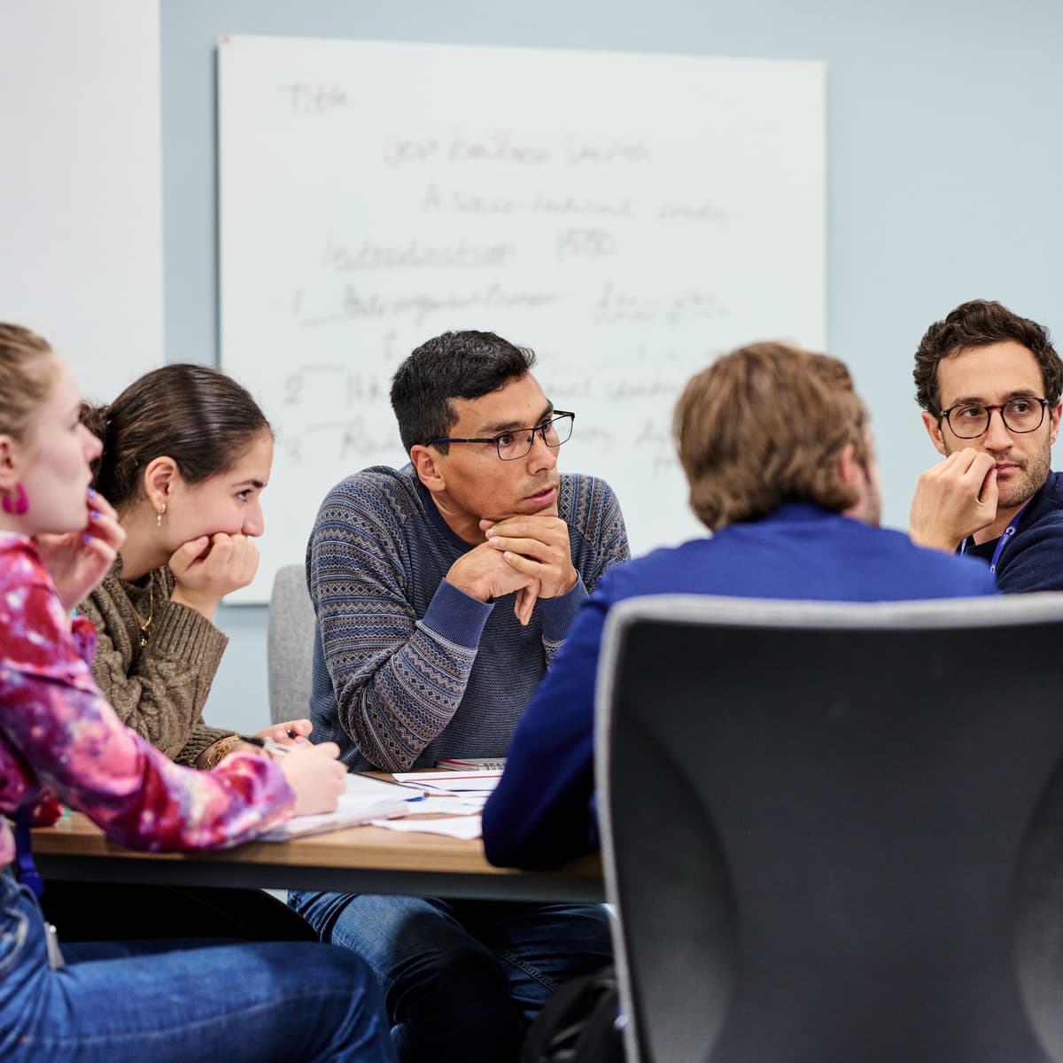 Researchers at table.