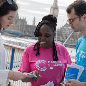 A photo of three Campaigns Ambassadors talking.