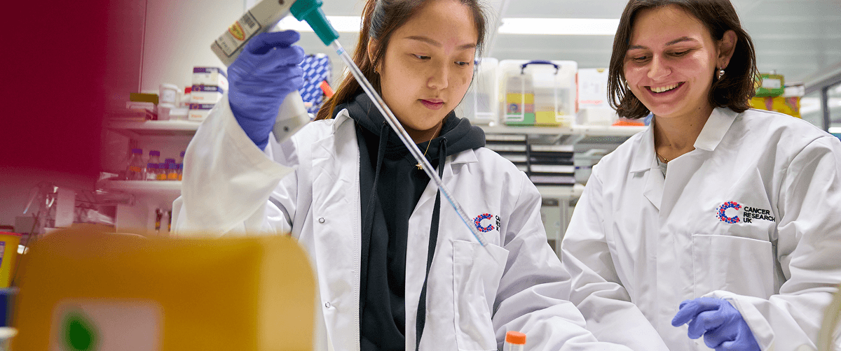 A photo of two researchers in a lab.
