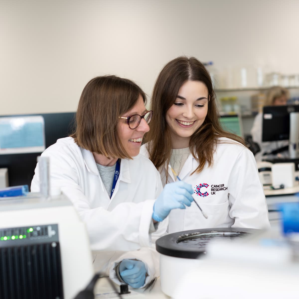 Two researchers working in the lab.