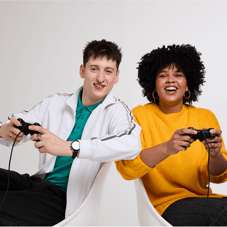 A photo of two people playing video games.