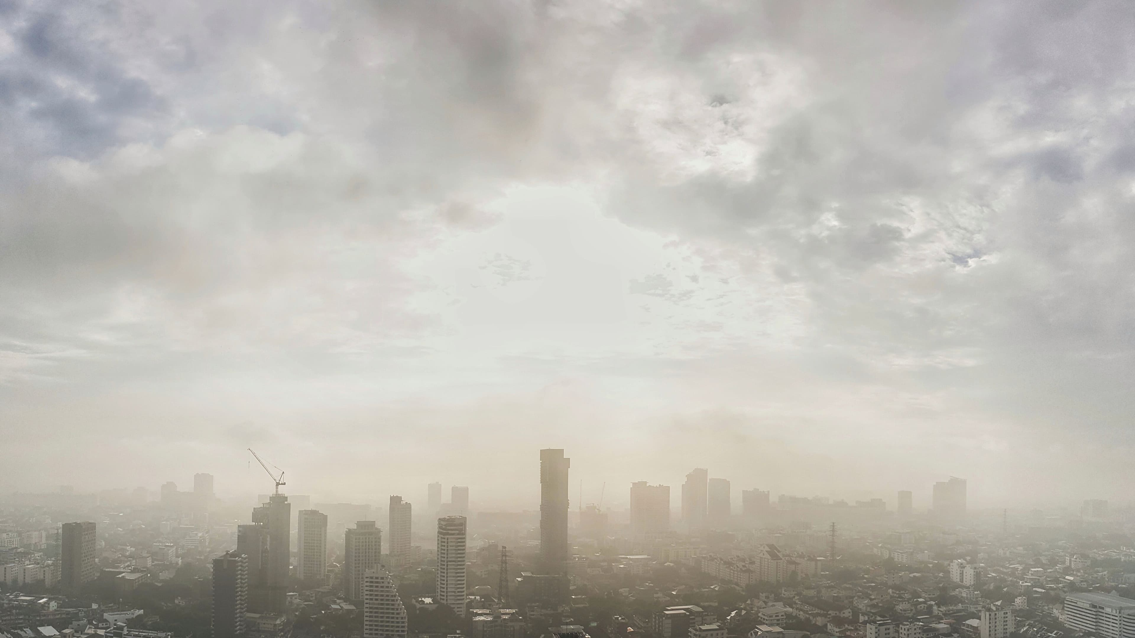 A city skyline obscured by pollution.
